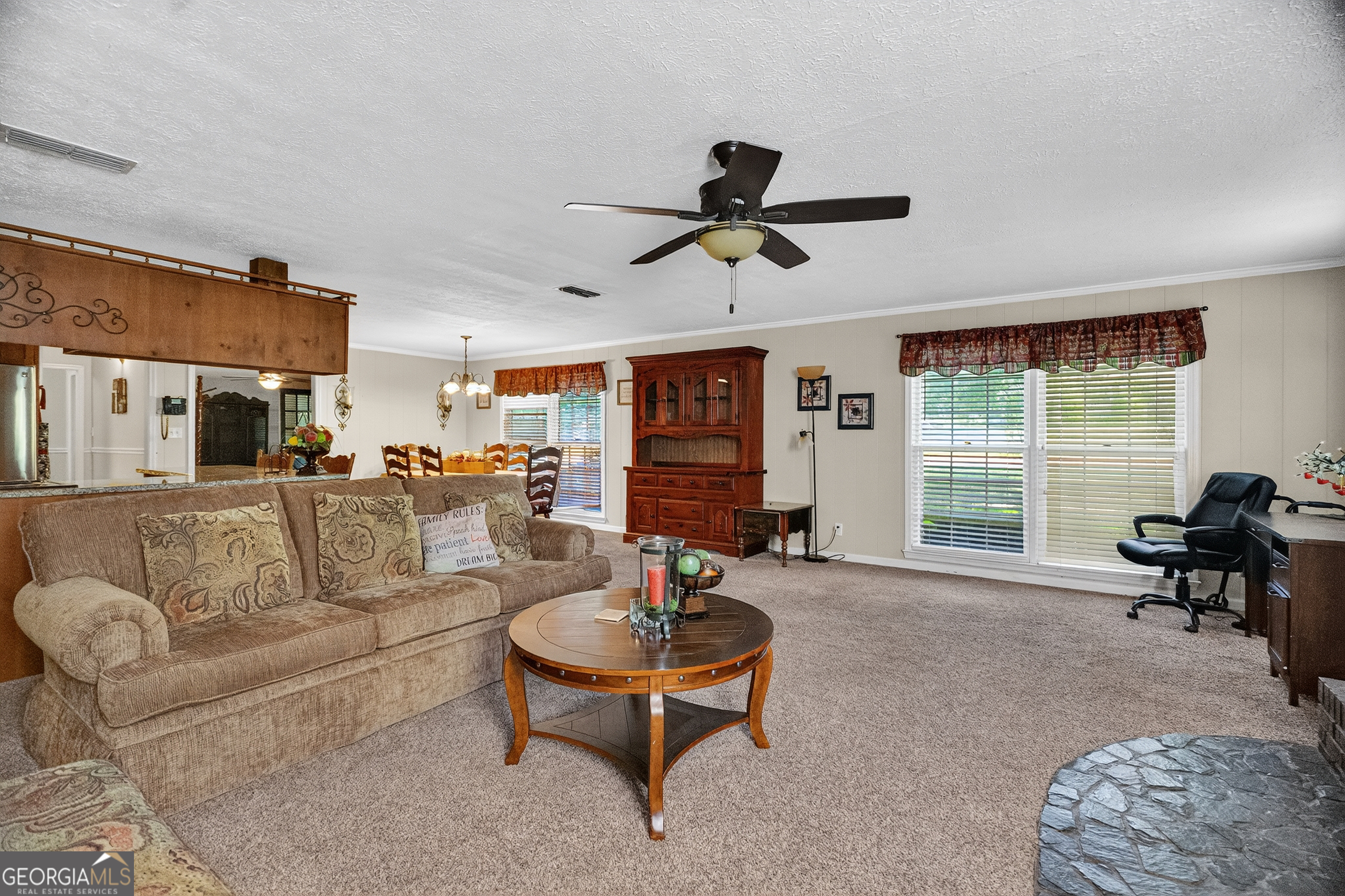 709 Vernon Ferry Road LaGrange, GA 30240 - Photo 9 of 27 a living room with furniture and a large window