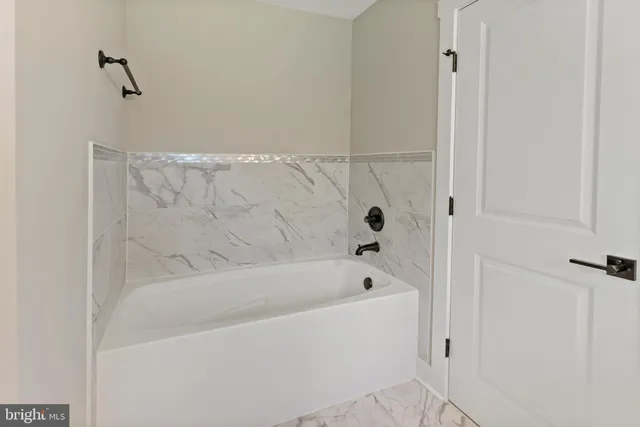 a bathroom with a bathtub