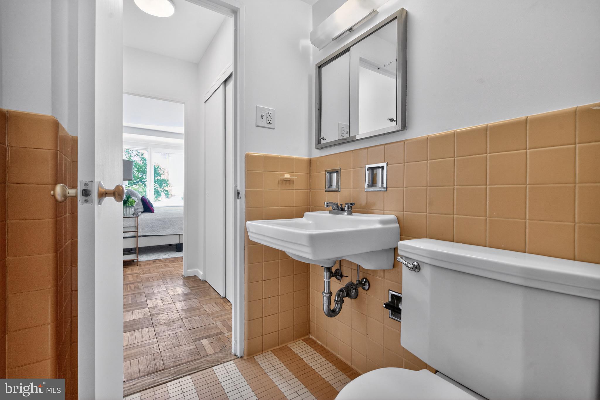 2475 Virginia Avenue Northwest, Unit 429 Washington, DC 20037 - Photo 17 of 35 a bathroom with a sink toilet and shower