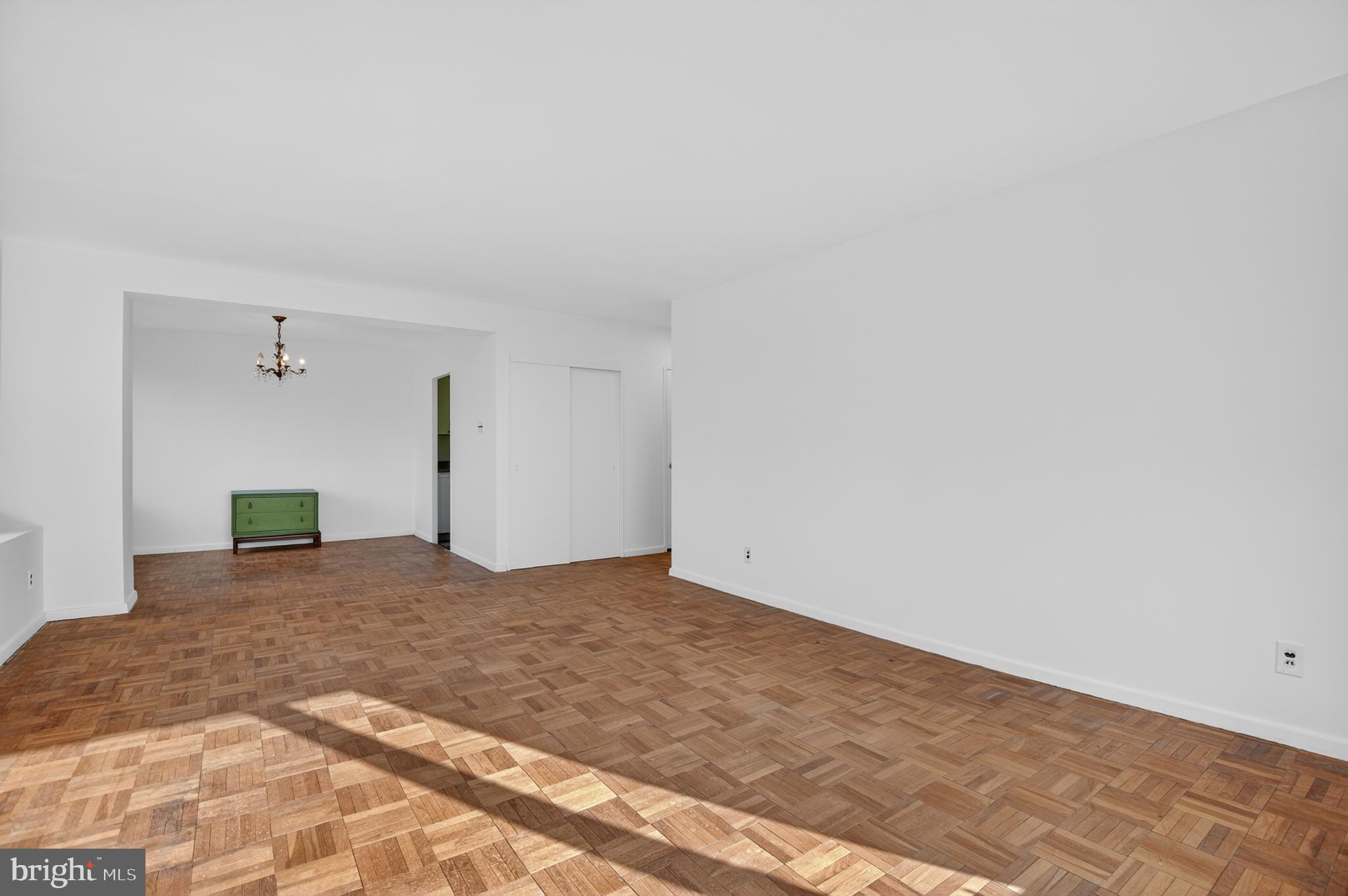 2475 Virginia Avenue Northwest, Unit 429 Washington, DC 20037 - Photo 21 of 27 a view of an empty room and kitchen