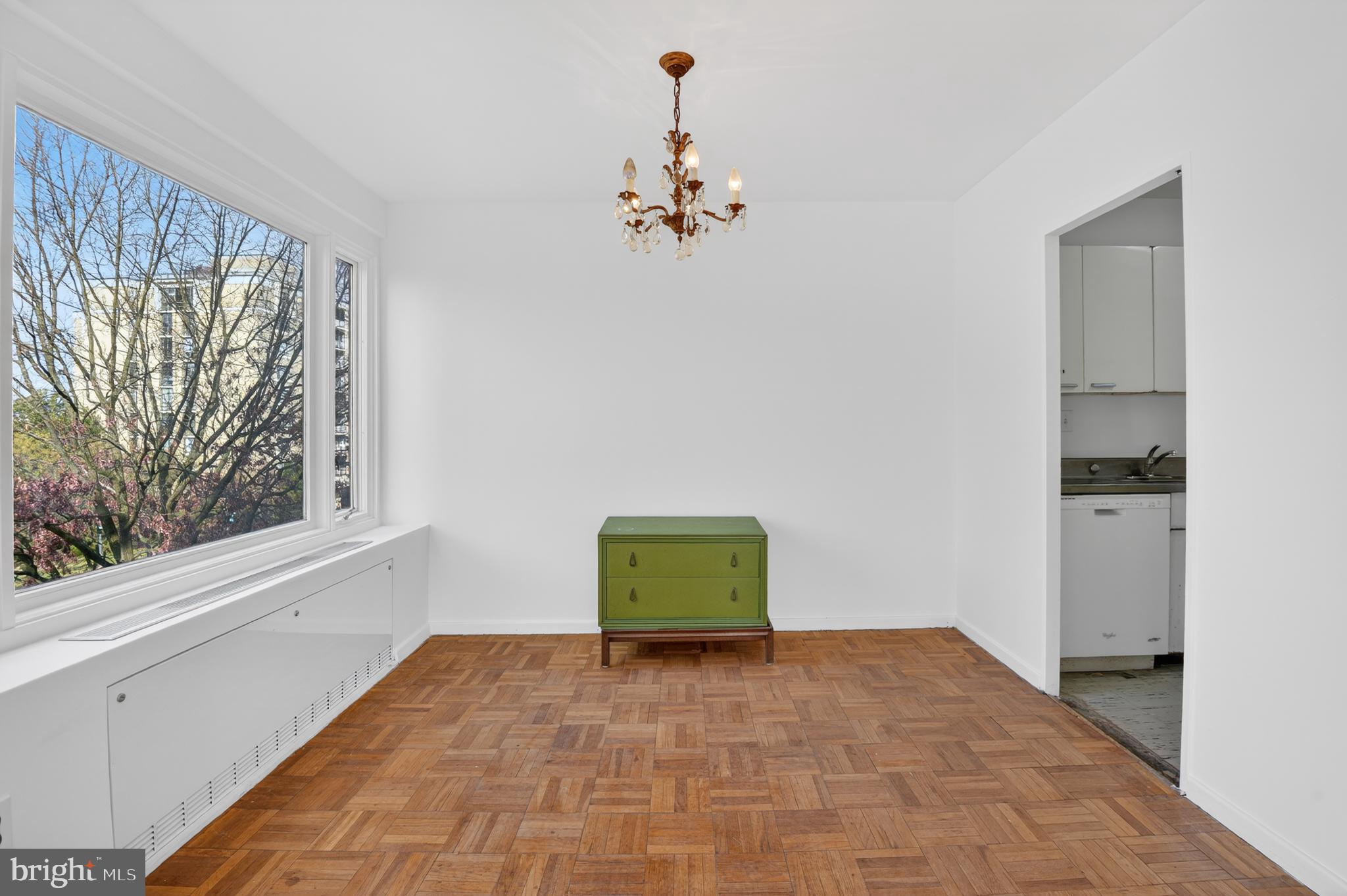 2475 Virginia Avenue Northwest, Unit 429 Washington, DC 20037 - Photo 24 of 27 a room with a window and ceiling fan