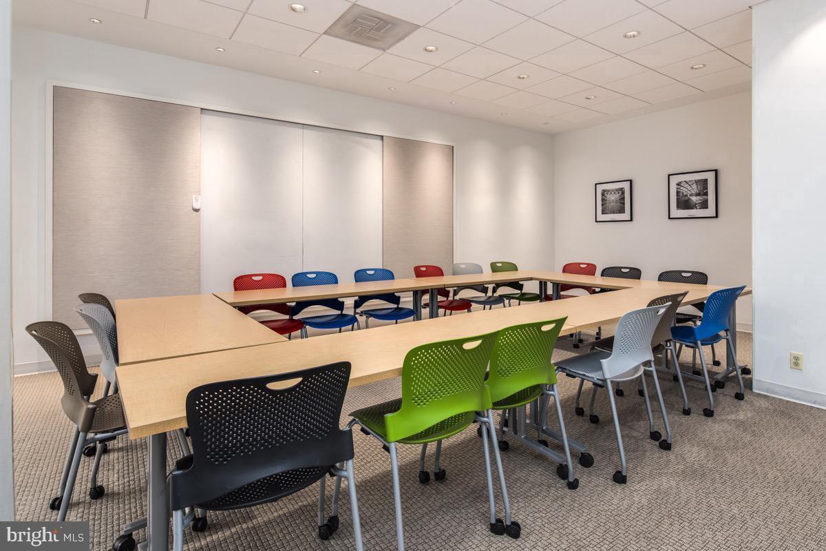 2475 Virginia Avenue Northwest, Unit 429 Washington, DC 20037 - Photo 25 of 27 a dining room with a table and chairs