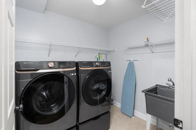 a utility room with dryer and washer