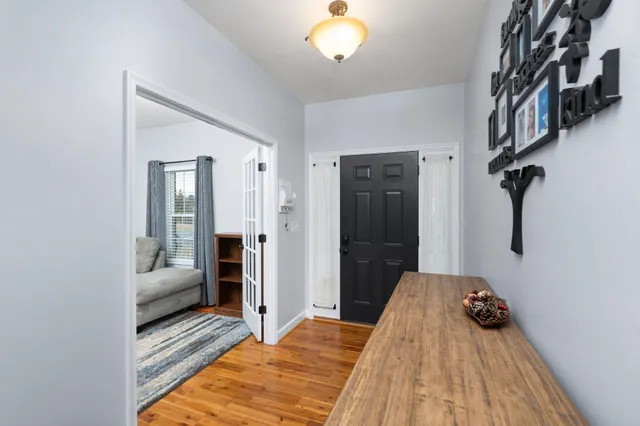 a bedroom with a bed and a couch