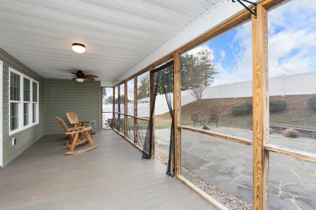 a view of a room with a large window