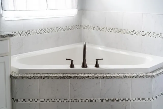 a view of a livingroom with entryway and furniture