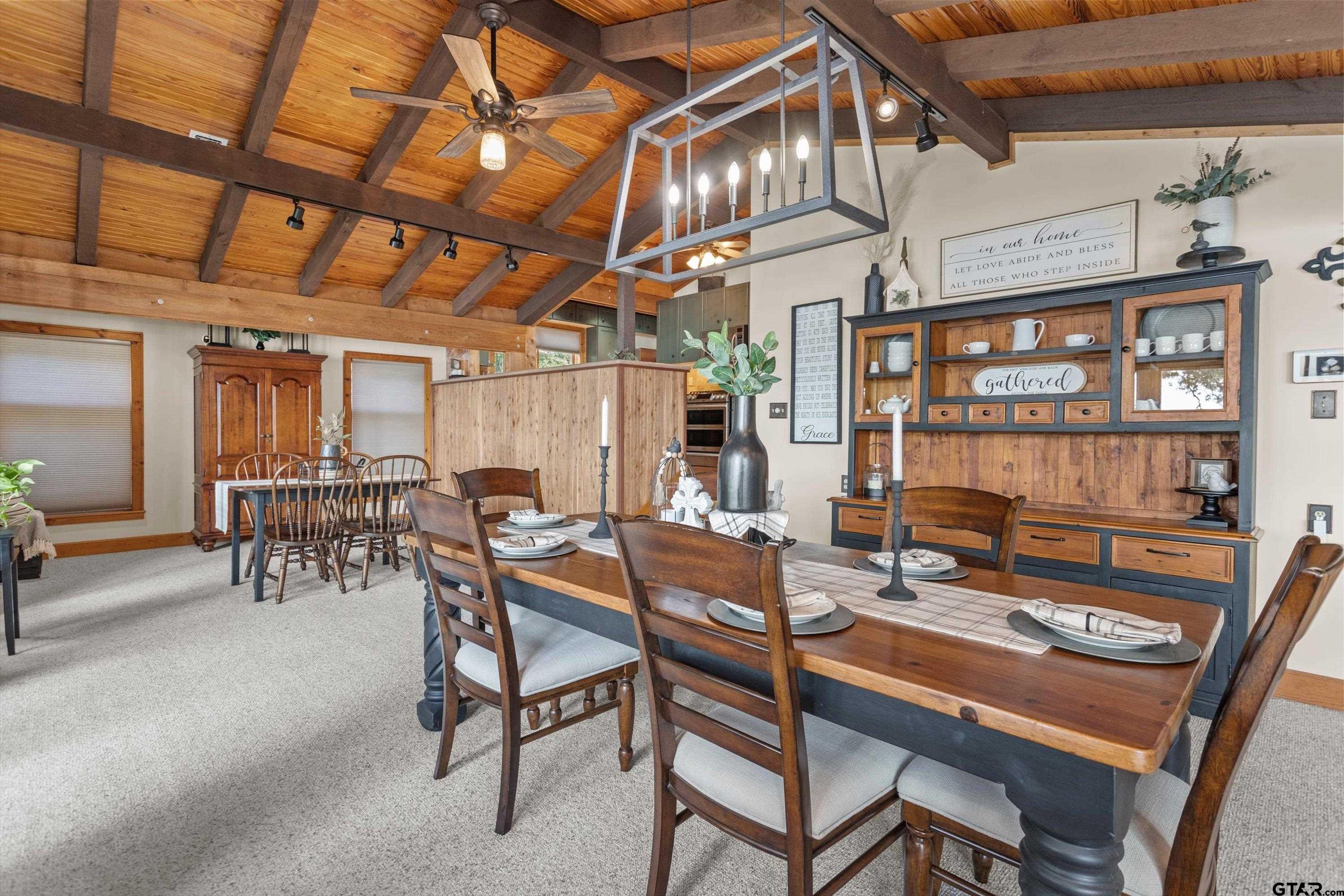 129 Tejas Trail Grapeland, TX 75844 - Photo 13 of 47 a dining room with furniture and a chandelier