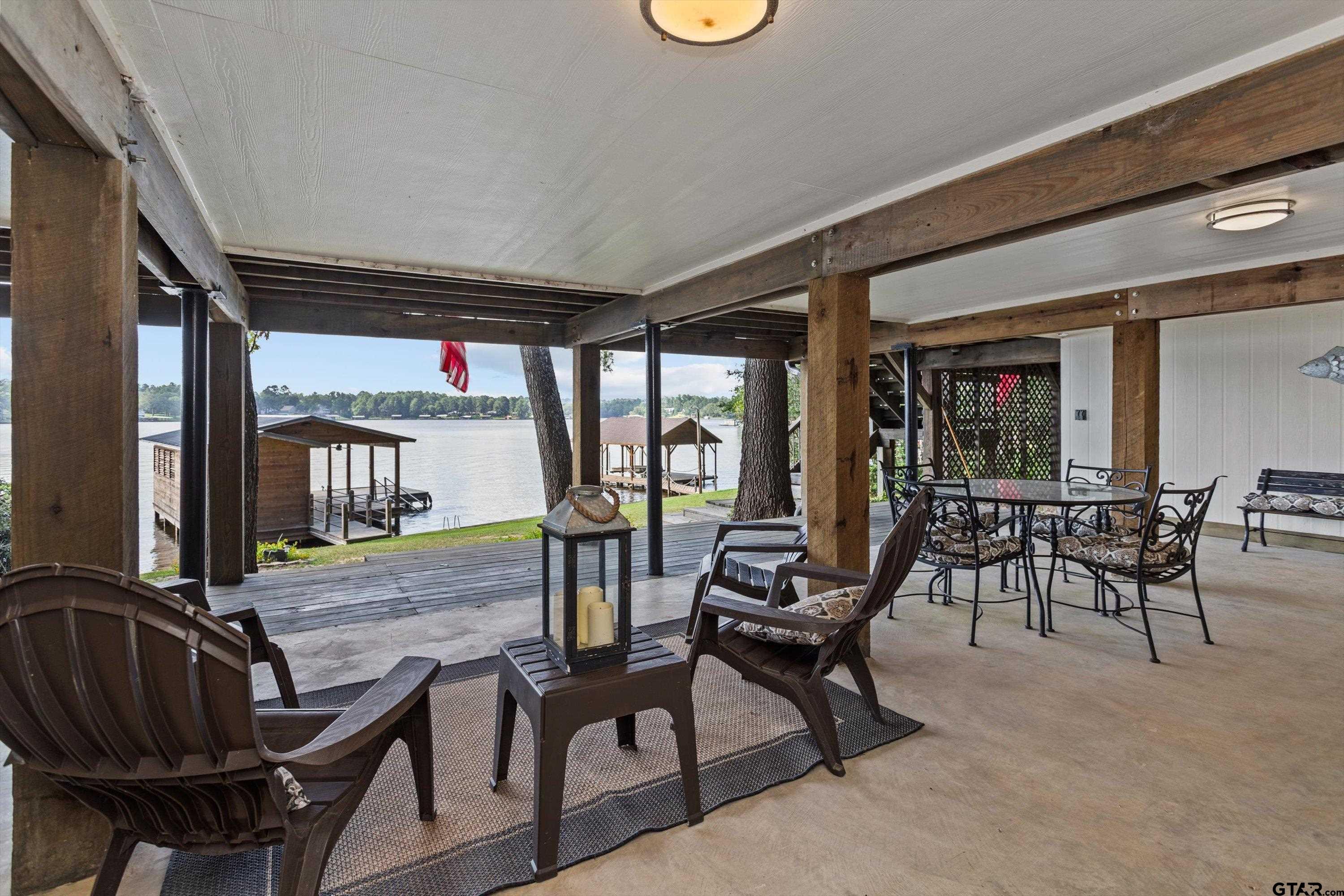 129 Tejas Trail Grapeland, TX 75844 - Photo 2 of 47 a view of a dining room with furniture window and outside view