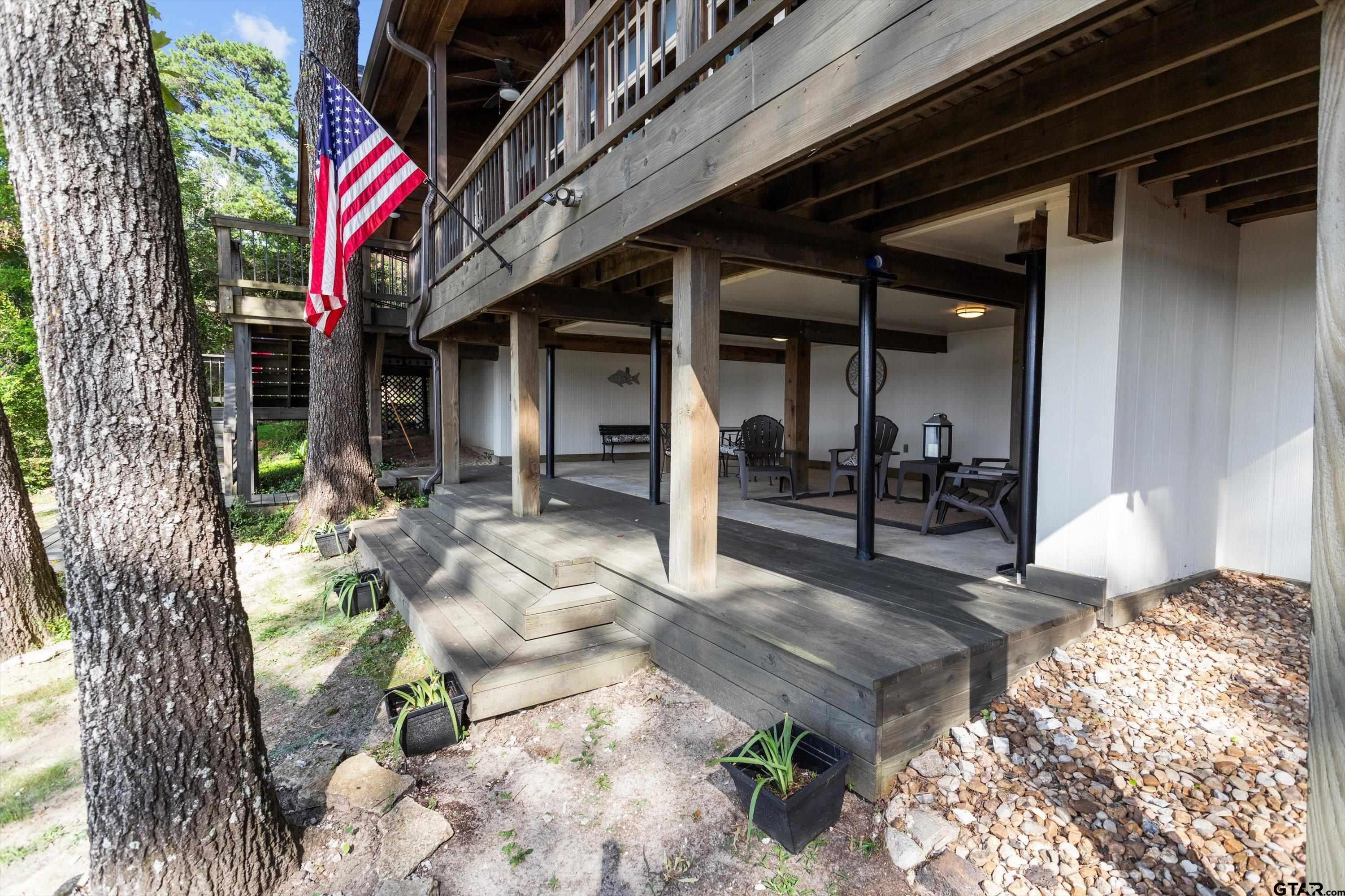 129 Tejas Trail Grapeland, TX 75844 - Photo 44 of 47 a view of a chairs and table in the patio