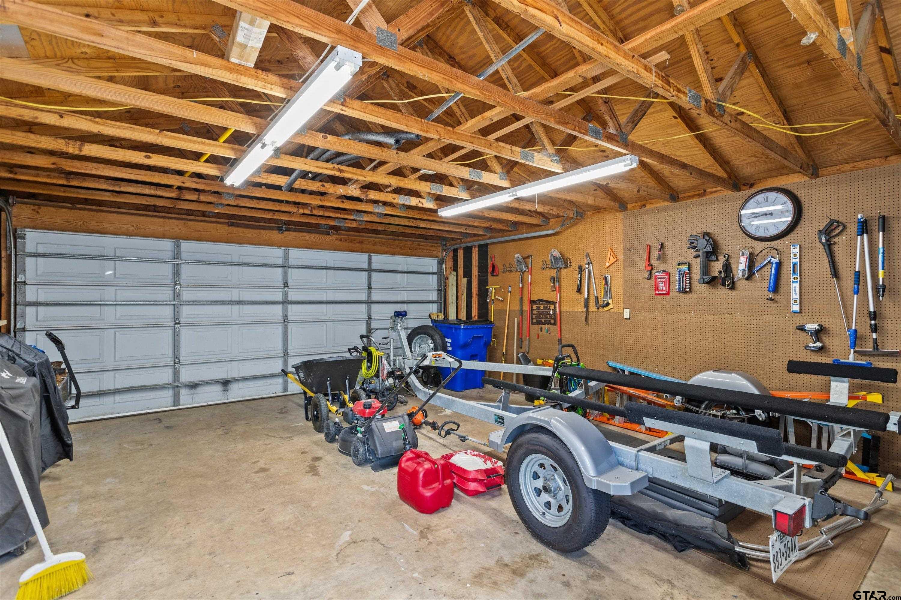 129 Tejas Trail Grapeland, TX 75844 - Photo 47 of 47 a utility room with dryer and bicycles