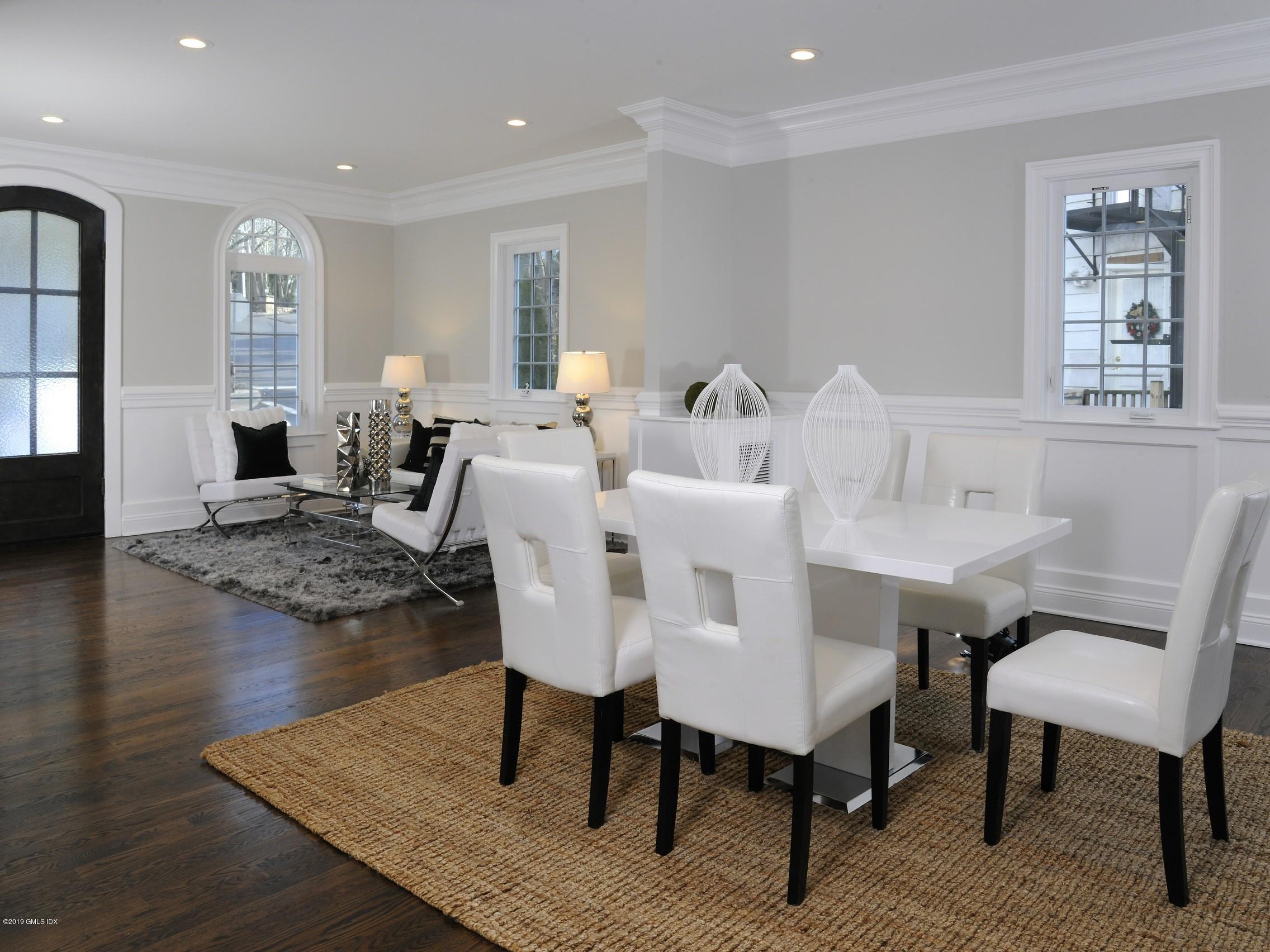 200 Davis Avenue Greenwich, CT 06830 - Photo 5 of 26 a living room with furniture rug and window