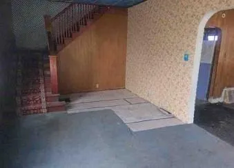 a view of a hallway with staircase