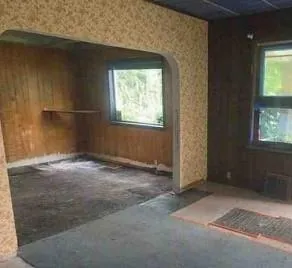 an empty room with windows