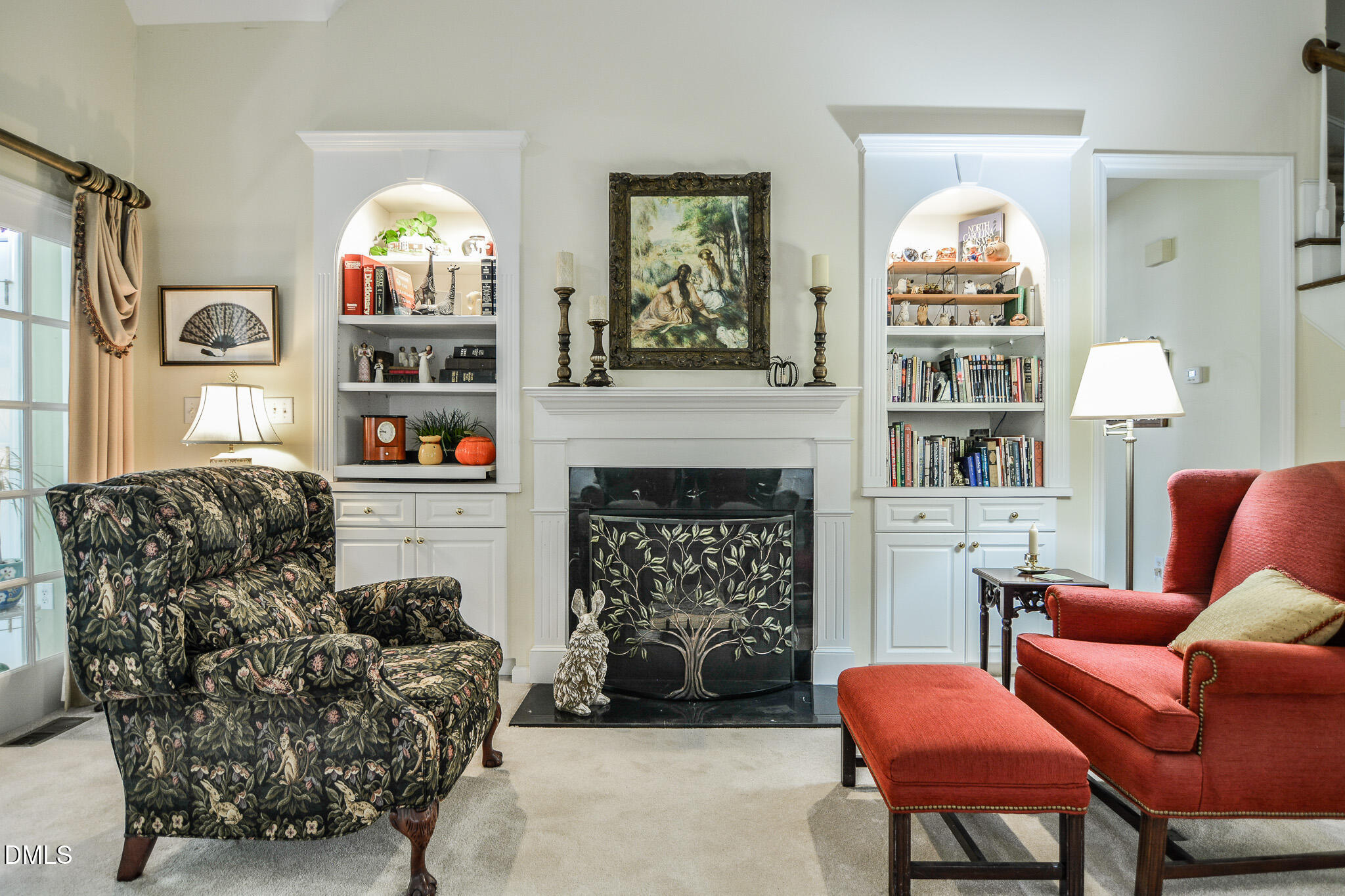 105 Trailing Oak Trail Clayton, NC 27527 - Photo 13 of 61 a living room with furniture fireplace and a large window