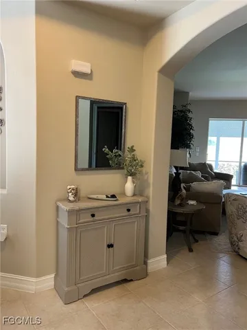 a en suite bathroom with a sink and a mirror