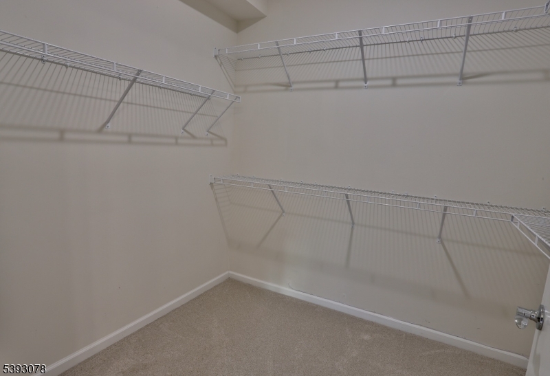 18 Barnett Road Flemington, NJ 08822 - Photo 15 of 25 a view of a room with racks on the wall