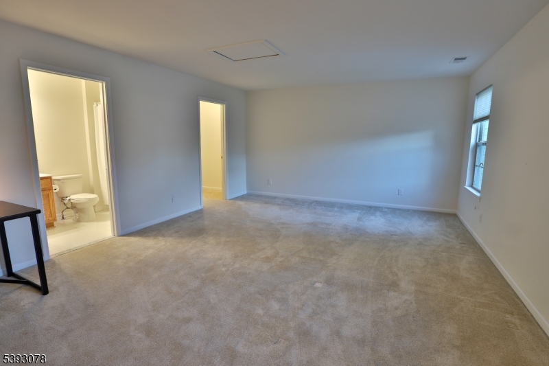 18 Barnett Road Flemington, NJ 08822 - Photo 17 of 25 a view of an empty room with a window