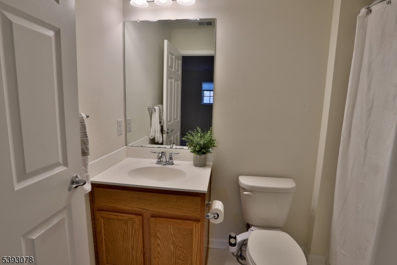 18 Barnett Road Flemington, NJ 08822 - Photo 18 of 25 a bathroom with a sink and a toilet