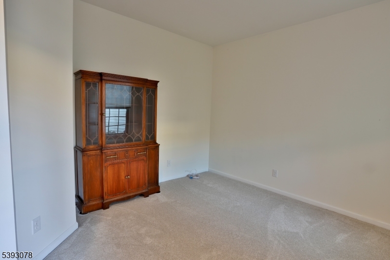 18 Barnett Road Flemington, NJ 08822 - Photo 4 of 25 a view of an empty room and wooden door