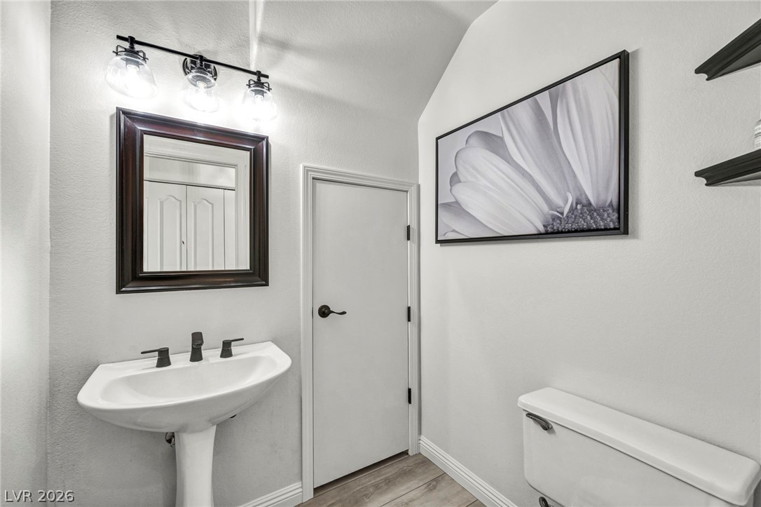 2132 Polynesia Circle Henderson, NV 89074 - Photo 20 of 25 Downstairs bath with lots of storage under the stairwell.