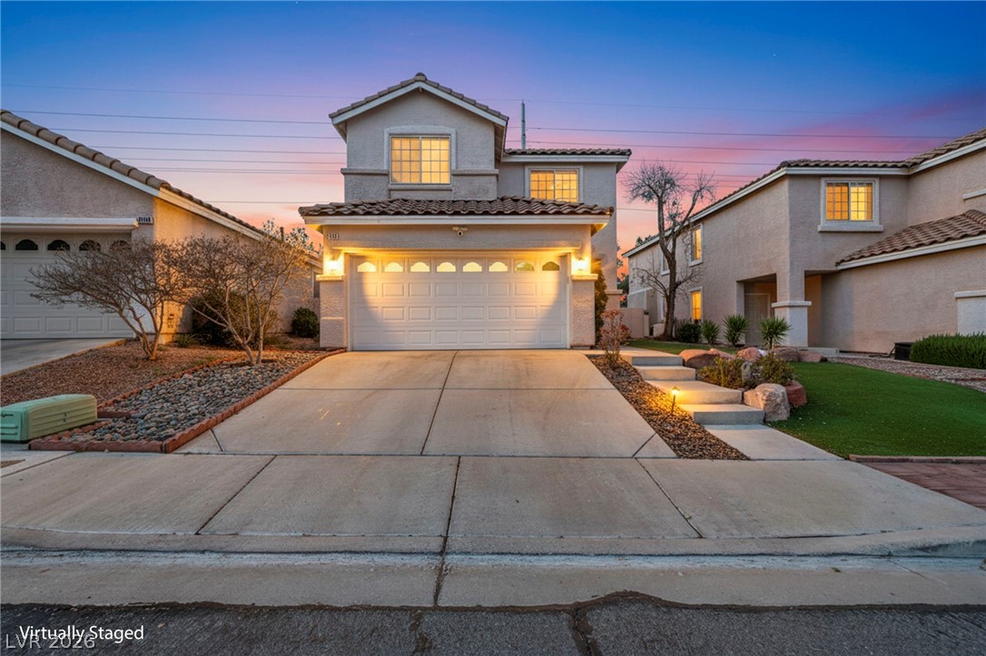 2132 Polynesia Circle Henderson, NV 89074 - Photo 25 of 25 There’s something special about this home at dusk. The soft lighting and peaceful surroundings create a warm, welcoming feel you simply can’t capture during the day.