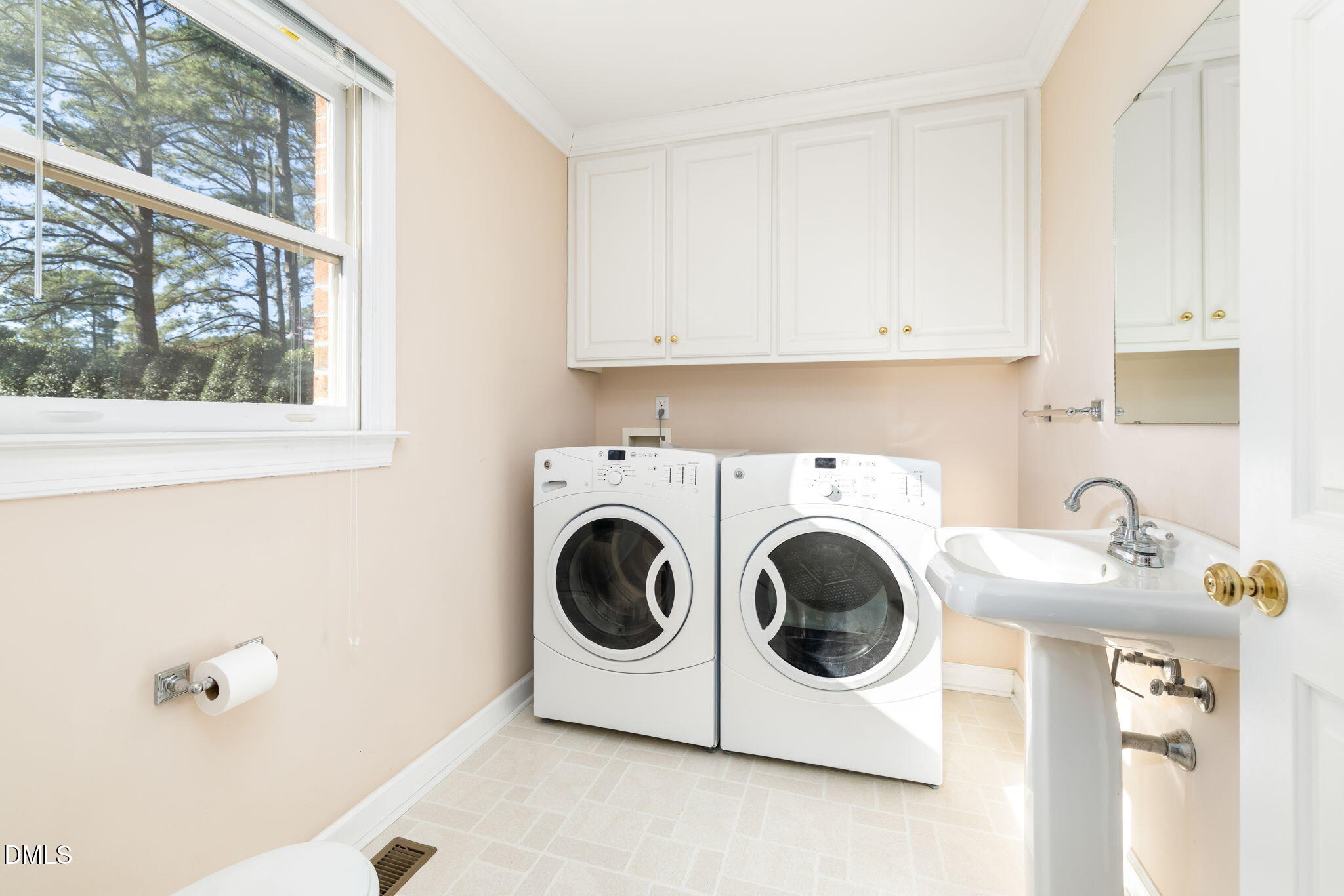 4076 Salem Farm Road Oxford, NC 27565 - Photo 36 of 55 a utility room with sink dryer and washer