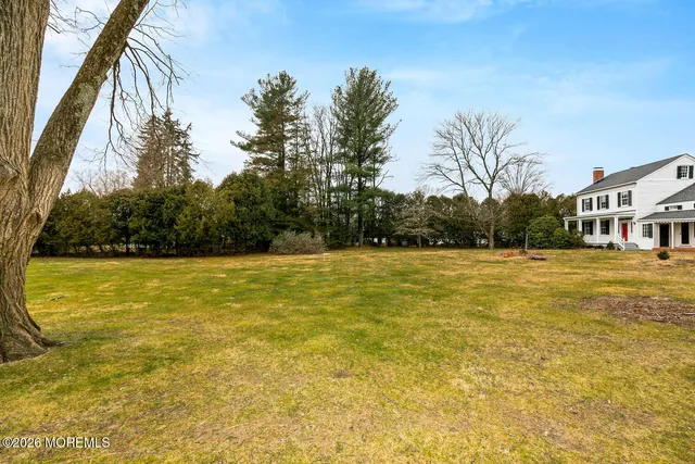 a view of swimming pool with an outdoor space and seating area