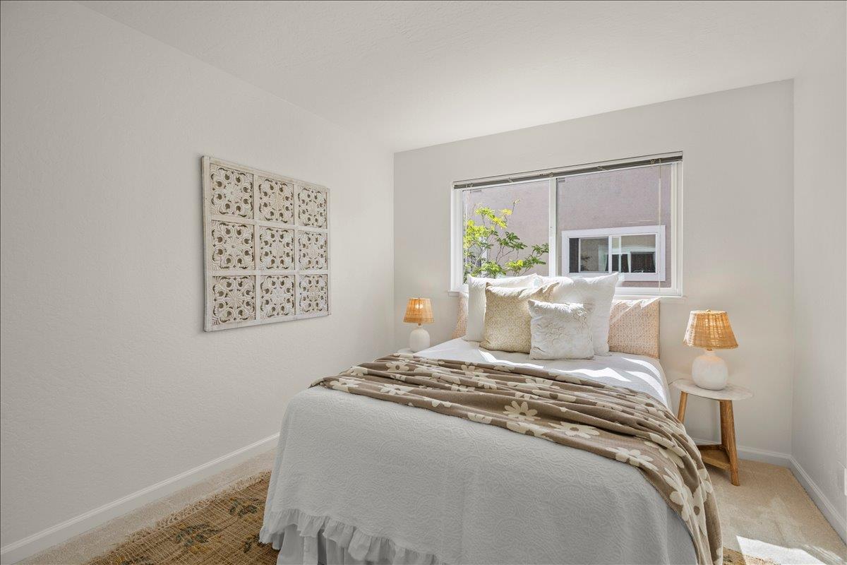 284 Rio Verde Place, Unit 3 Milpitas, CA 95035 - Photo 17 of 29 a bedroom with a bed and a window