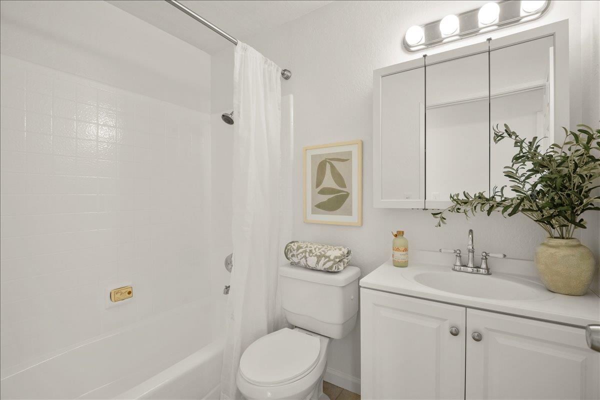 284 Rio Verde Place, Unit 3 Milpitas, CA 95035 - Photo 19 of 29 a bathroom with a sink a toilet and shower