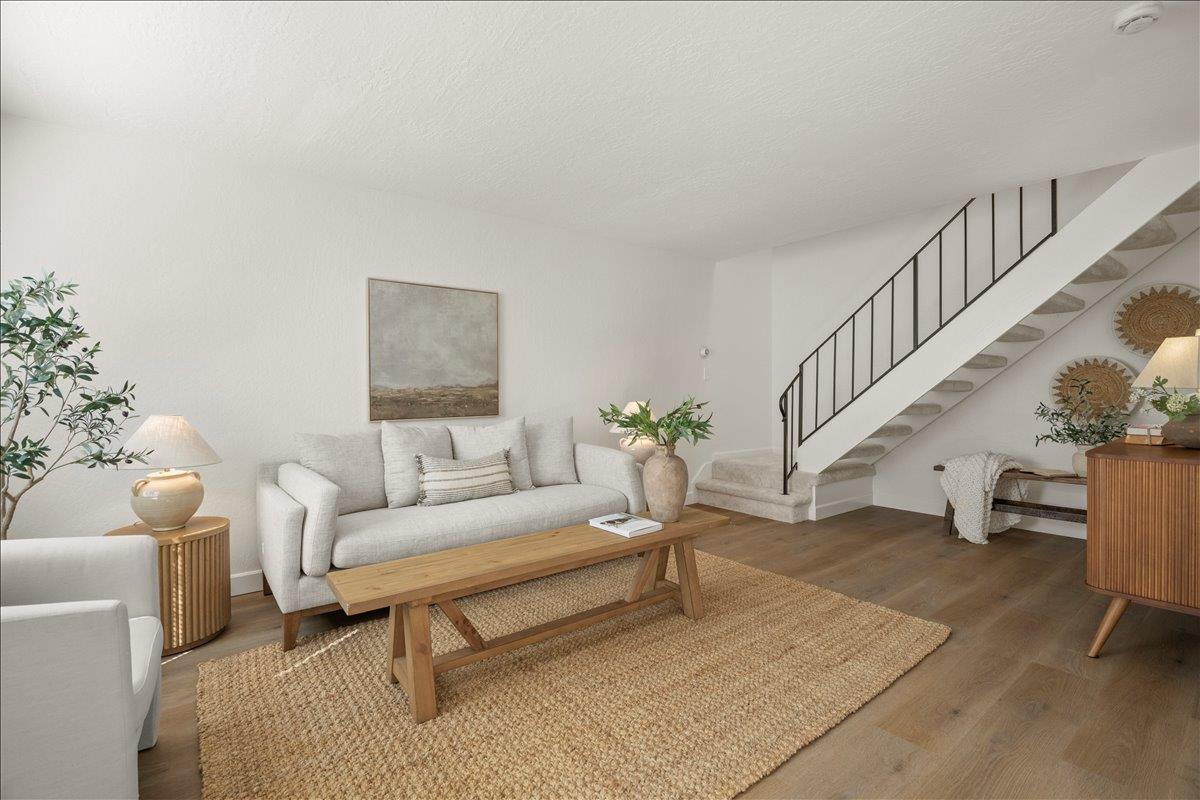 284 Rio Verde Place, Unit 3 Milpitas, CA 95035 - Photo 2 of 29 a living room with furniture and a table