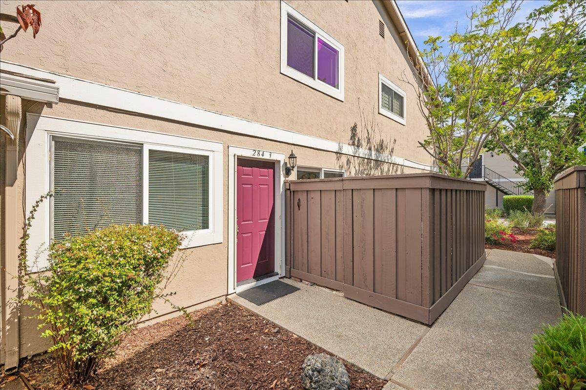 284 Rio Verde Place, Unit 3 Milpitas, CA 95035 - Photo 24 of 29 a view of a house with a garage and yard