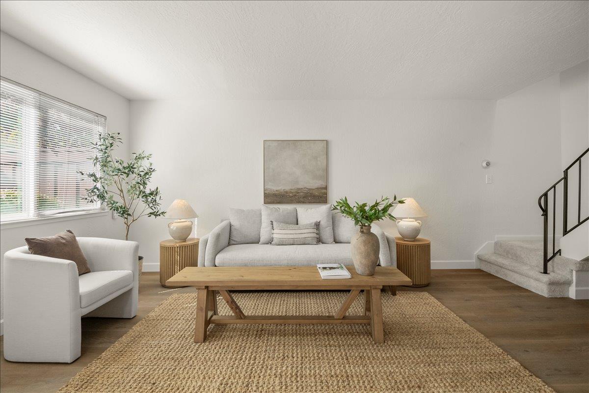 284 Rio Verde Place, Unit 3 Milpitas, CA 95035 - Photo 3 of 29 a living room with furniture a rug and a potted plant