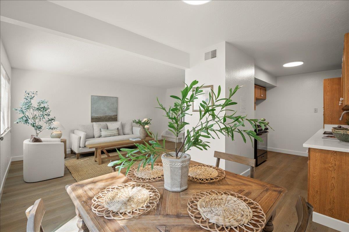 284 Rio Verde Place, Unit 3 Milpitas, CA 95035 - Photo 7 of 29 a living room with furniture potted plant and a table