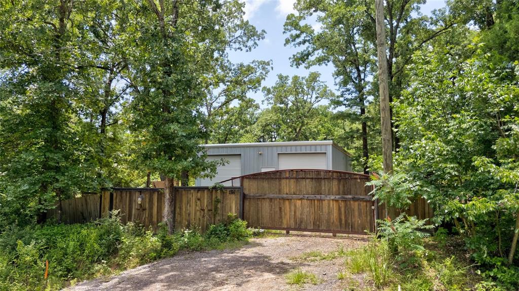 136 Kings Row Malakoff, TX 75148 - Photo 14 of 22 a view of a back yard