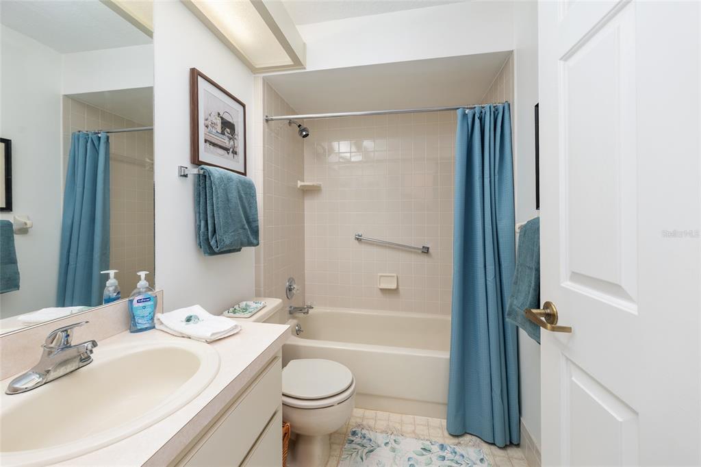 8038 Southwest 108th Loop Ocala, FL 34481 - Photo 29 of 48 a bathroom with a sink toilet and shower