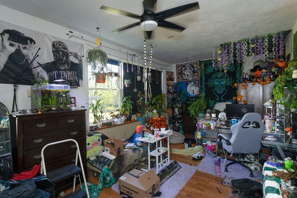 157 School Street North Brookfield, MA 01535 - Photo 17 of 29 a view of a workspace with furniture and a potted plant