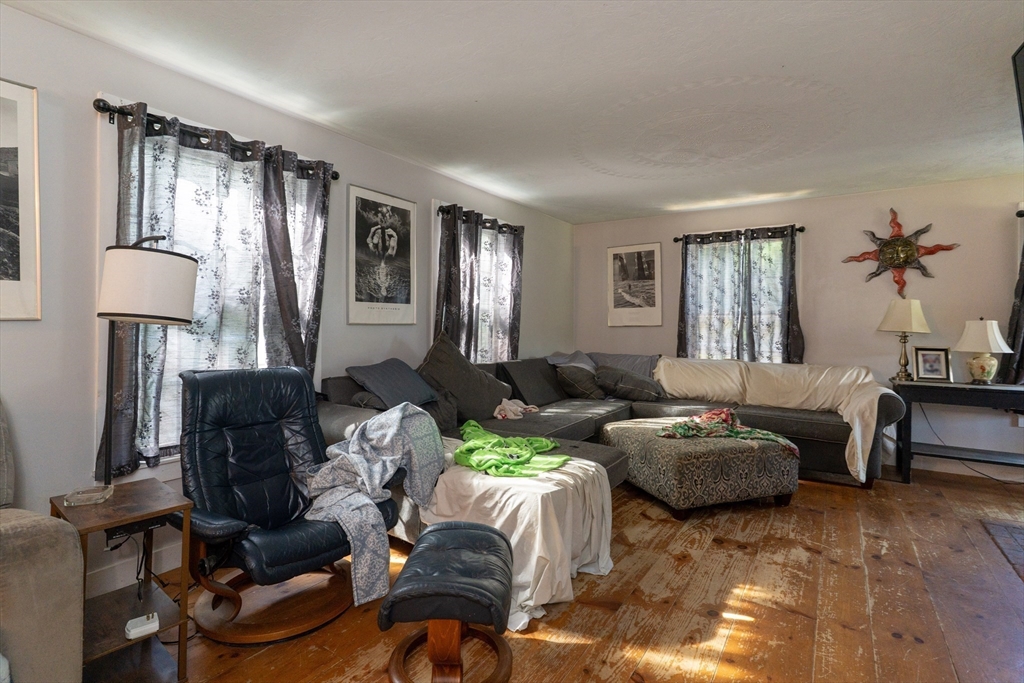 157 School Street North Brookfield, MA 01535 - Photo 19 of 29 a living room with furniture and a window