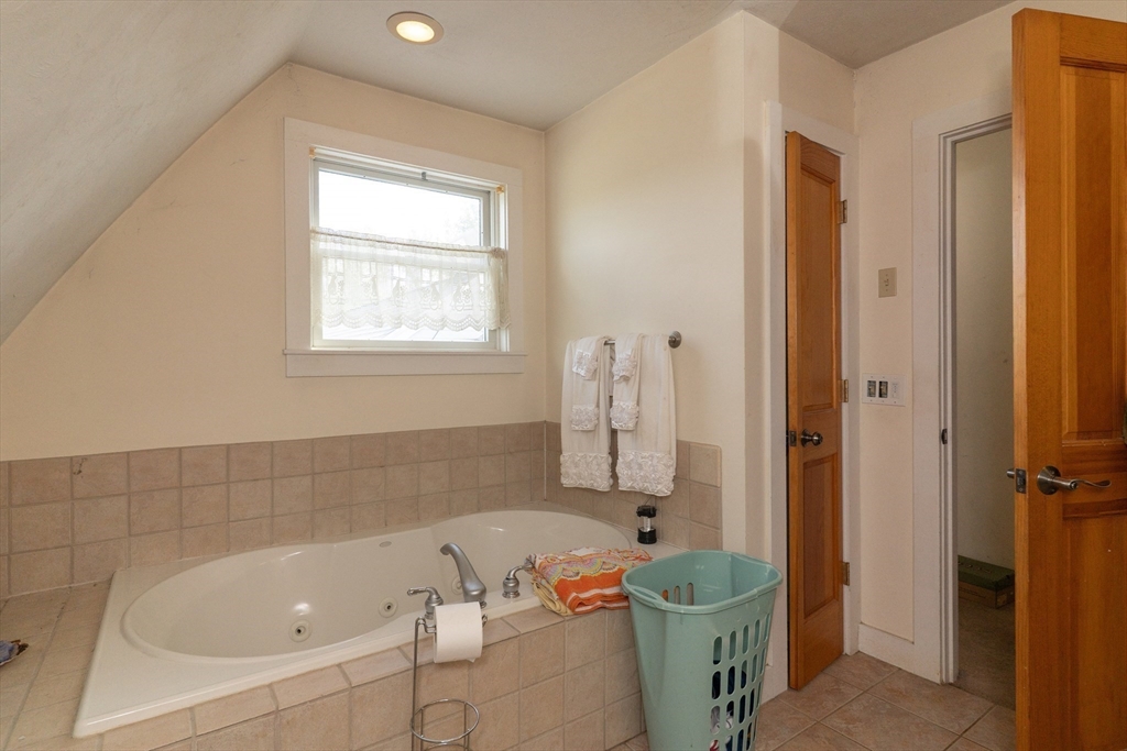 157 School Street North Brookfield, MA 01535 - Photo 24 of 29 a bath room with a sink and a tub