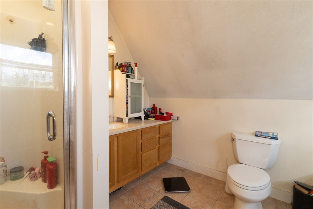 157 School Street North Brookfield, MA 01535 - Photo 25 of 29 a bathroom with a toilet a sink and a mirror