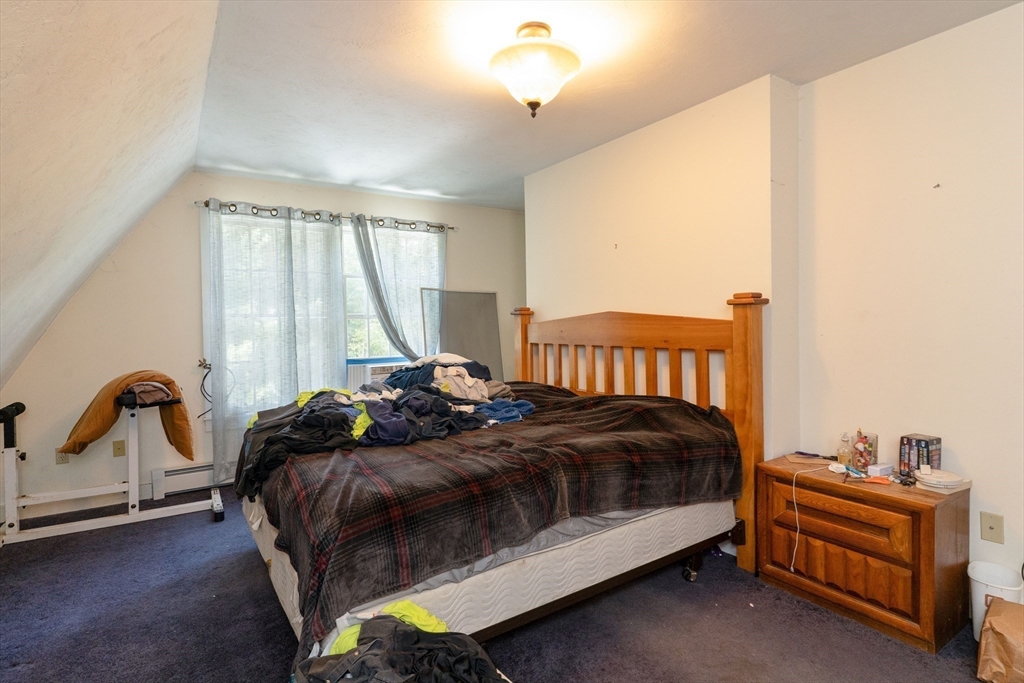 157 School Street North Brookfield, MA 01535 - Photo 26 of 29 a bedroom with a bed and a window