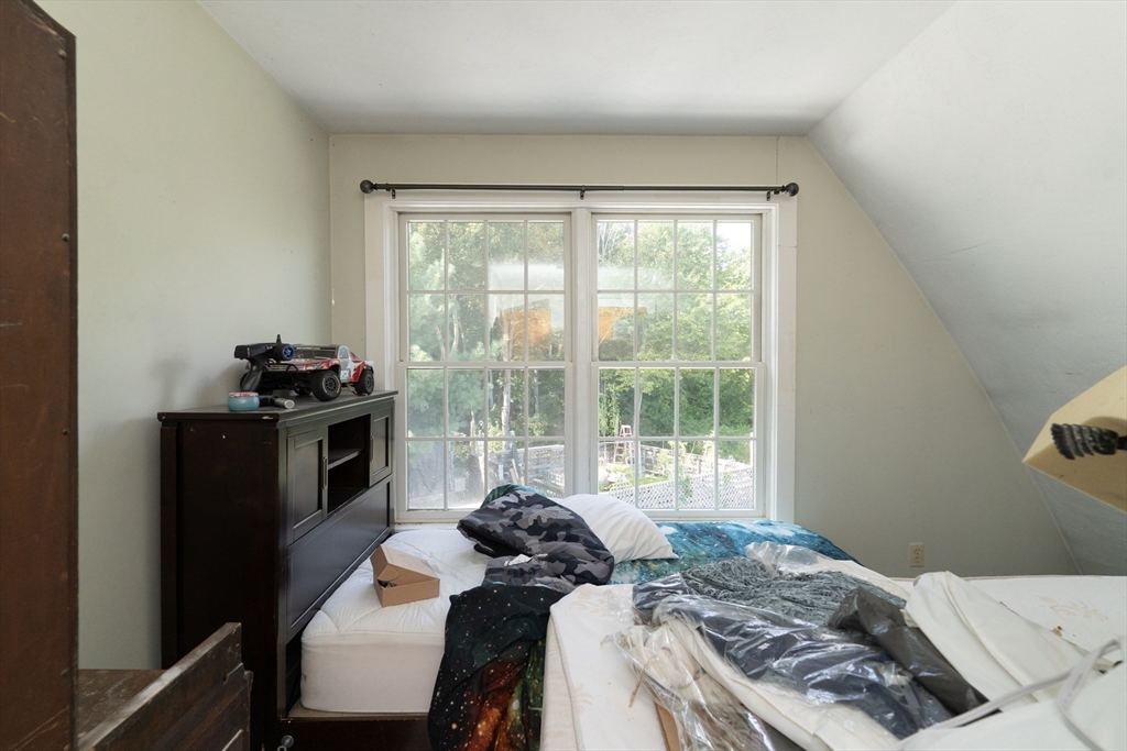 157 School Street North Brookfield, MA 01535 - Photo 28 of 29 a bedroom with a bed and a window