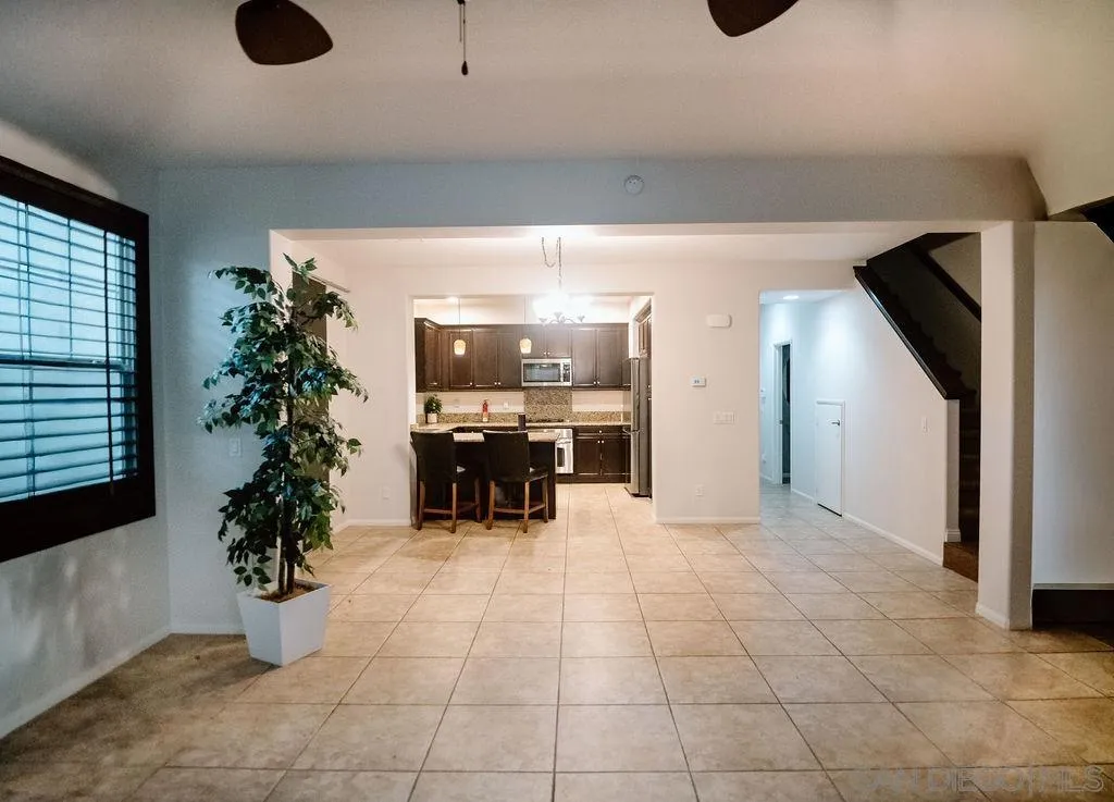 1808 Cyan Lane Chula Vista, CA 91913 - Photo 19 of 43 a kitchen with a refrigerator and a potted plant
