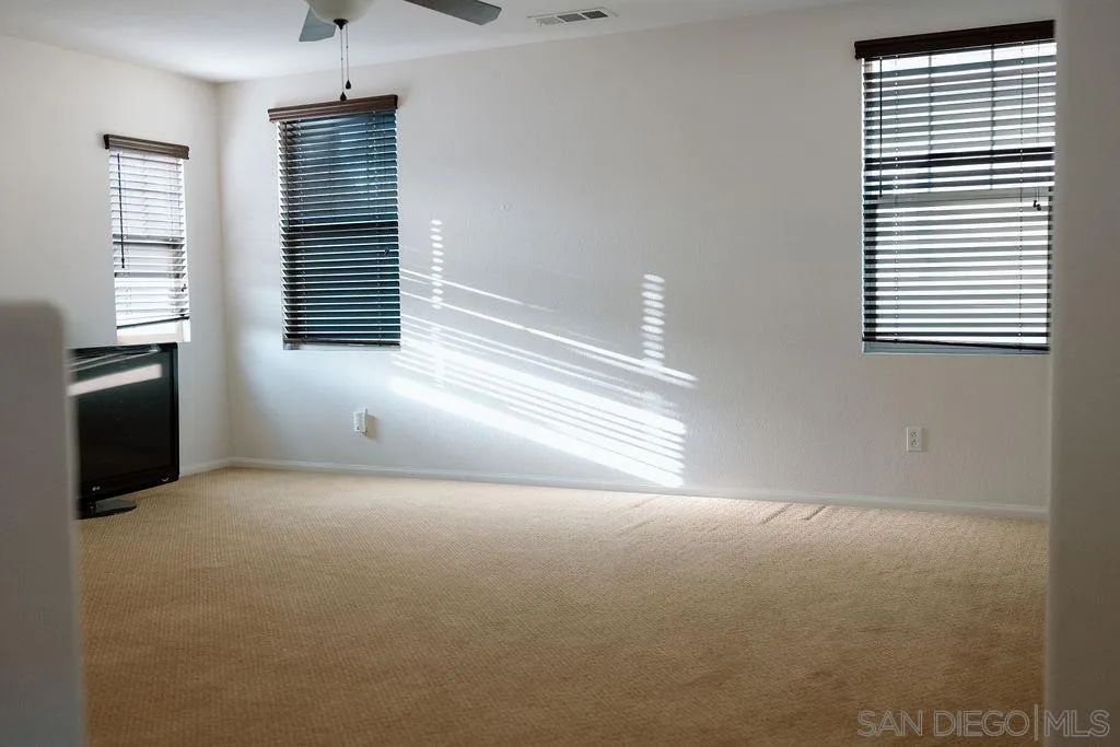 1808 Cyan Lane Chula Vista, CA 91913 - Photo 31 of 43 an empty room with windows