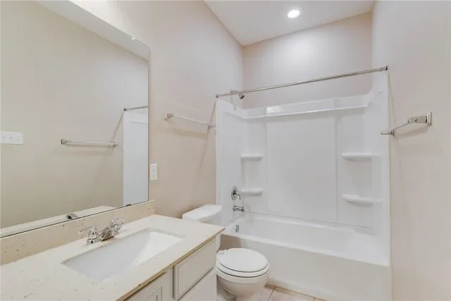 a bathroom with 2 sink and a mirror