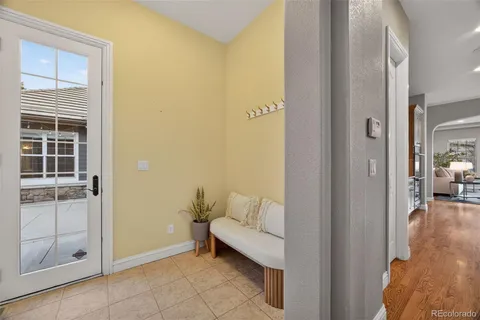 a view of a livingroom with furniture and front door