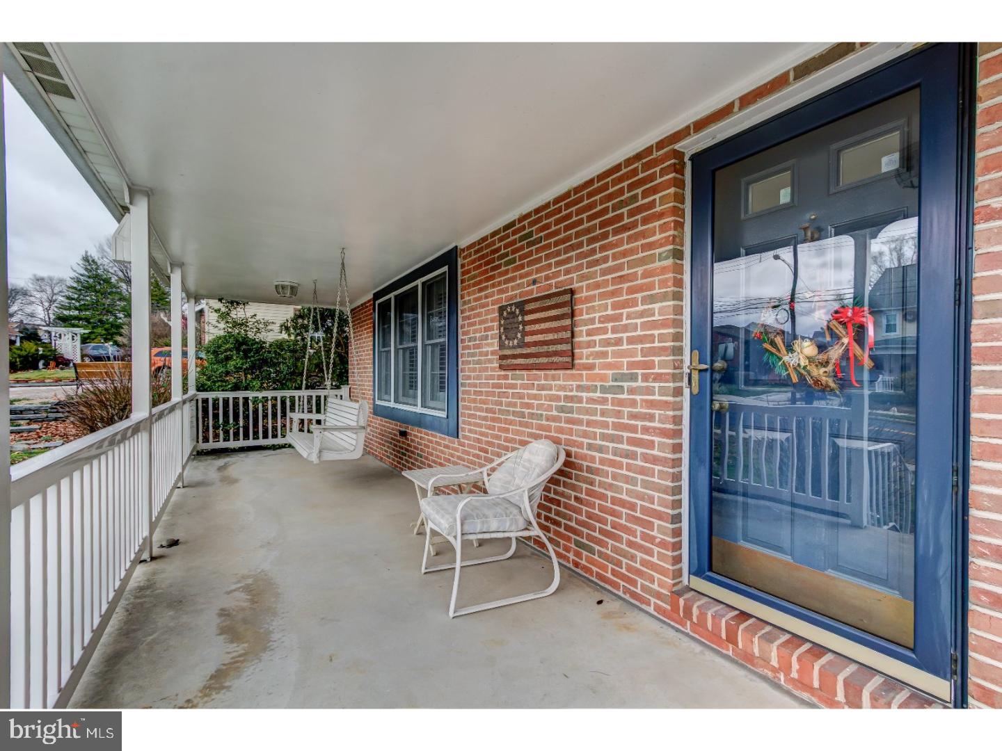 254 West Ridley Avenue Ridley Park, PA 19078 - Photo 6 of 25 a view of a porch with a bench