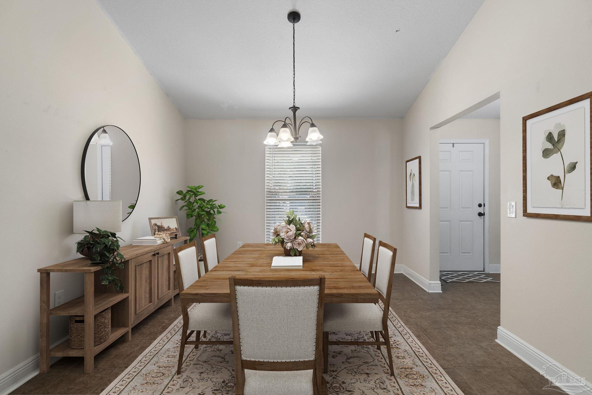 5607 Cane Syrup Circle Pace, FL 32571 - Photo 16 of 54 a dining room with furniture potted plants and wooden floor