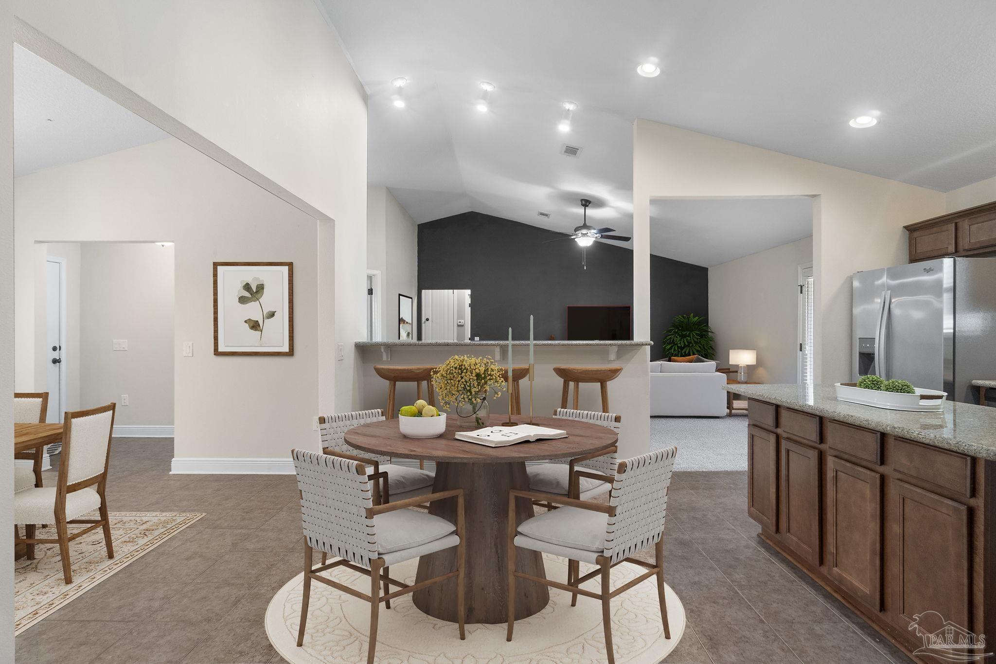 5607 Cane Syrup Circle Pace, FL 32571 - Photo 18 of 54 a view of a dining room with furniture