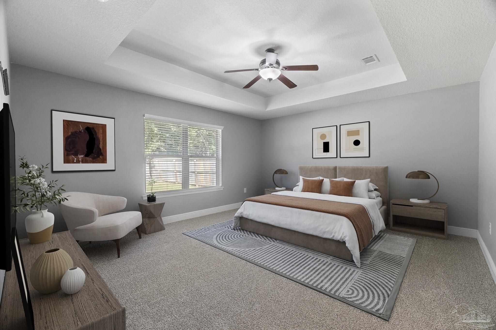 5607 Cane Syrup Circle Pace, FL 32571 - Photo 24 of 54 a spacious bedroom with a bed and ceiling fan