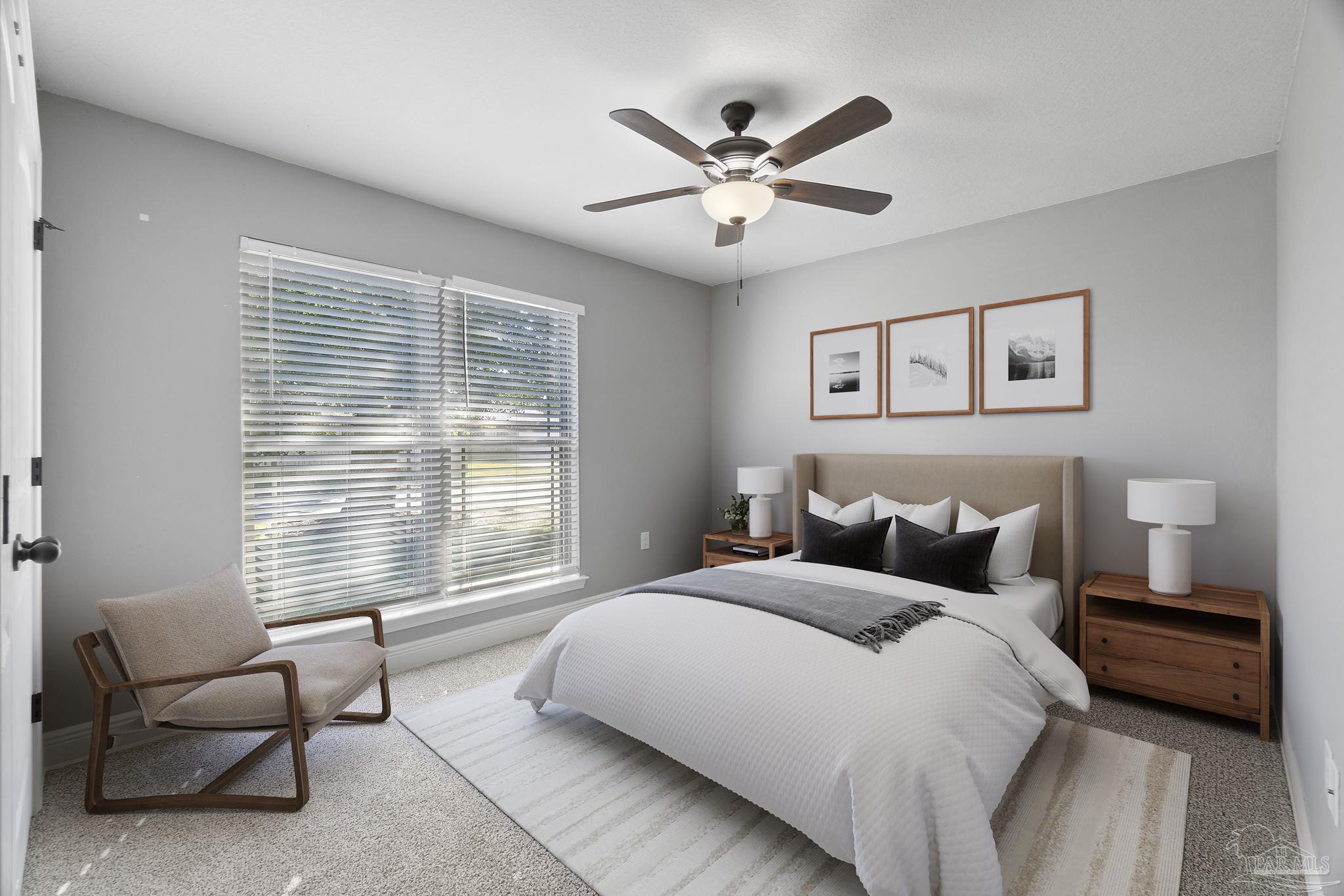 5607 Cane Syrup Circle Pace, FL 32571 - Photo 33 of 54 a bedroom with a large bed and a window